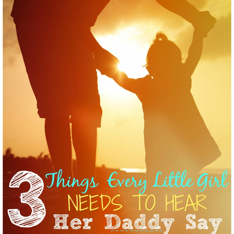 Silhouetted image of a man holding hands and walking with a young girl against a sunset background. The text overlay reads: "3 Things Every Little Girl Needs to Hear Her Daddy Say." The bottom right corner includes a website URL: whatmommydoes.com.