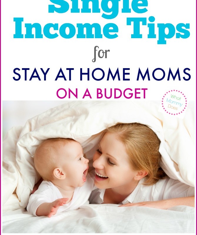 An image of a smiling mother lying in bed with her baby, both covered by a white duvet. The text reads, “Single Income Tips for Stay at Home Moms on a Budget”. The website "whatmommydoes.com" is displayed at the bottom, offering advice for single income families.
