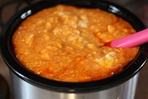 Delicious & Creamy Crockpot Buffalo Chicken Dip - This is my go-to buffalo chicken dip recipe for parties. Best when loaded with cream cheese & Frank's red hot sauce and served with celery or chips. An awesome yet simple appetizer made in a slow cooker…if you keep it in the crock pot, it stays hot the whole time! mmmmmm my mouth is drooling just writing this!