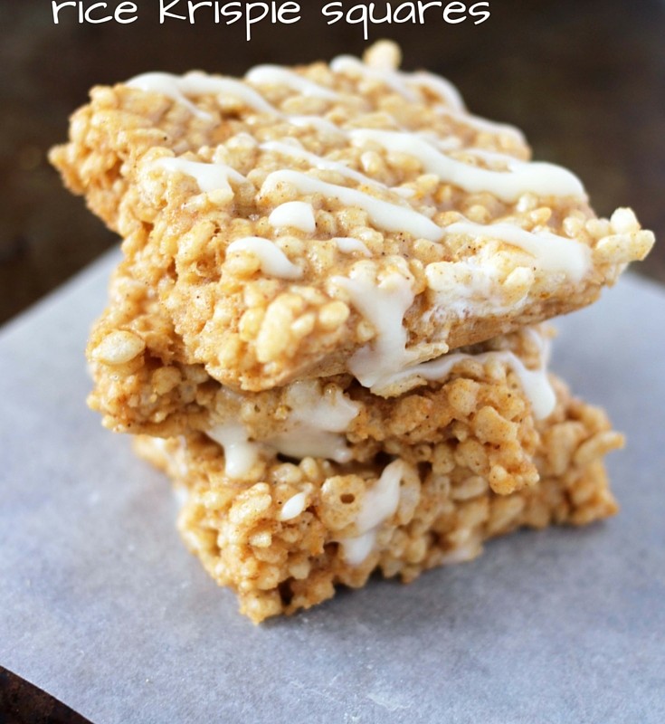 Pumpkin Spice Rice Krispie Treats, where have you been all my life?! I love this take on the original crispy cereal recipe - just as easy to make and great for a party or snack! I'm literally drooling just thinking aboutt the gooey butter, marshmallow, pumpkin combo with cream cheese drizzle!!