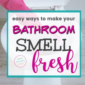 A person cleaning a toilet bowl inside a white frame. Text over the image reads, "best ways to make your BATHROOM SMELL fresh" in bold and cursive fonts. A small logo on the bottom left reads, "What Mommy Does.