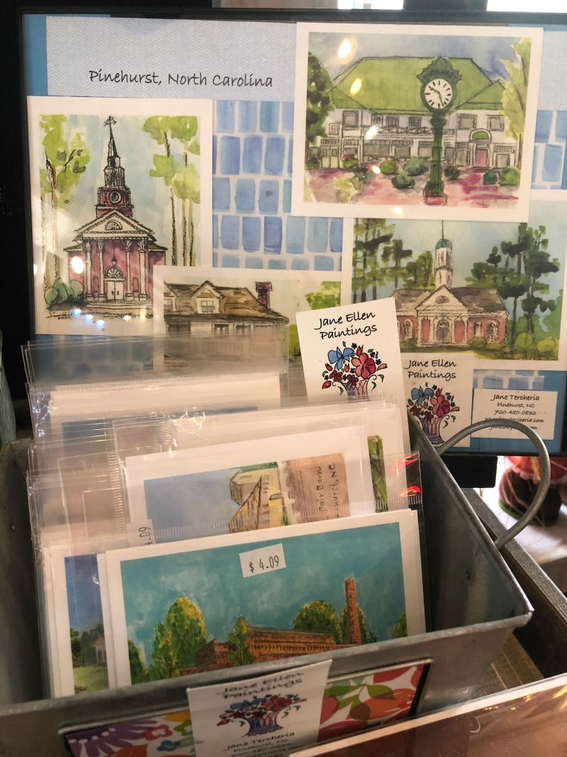These hand-painted images of local landmarks and images make great gifts!