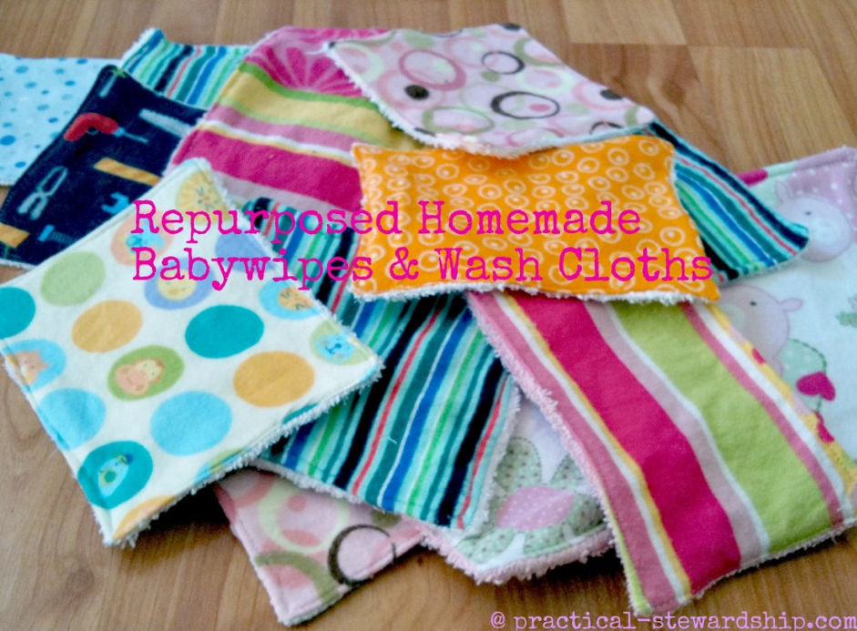 A collection of colorful, repurposed homemade baby wipes and washcloths are laid out on a wooden surface. The fabrics feature various patterns, including stripes, polka dots, and animal prints. Text over the image reads "Repurposed Homemade Baby Wipes & Wash Cloths—Perfect Baby Craft Ideas to Make & Sell.