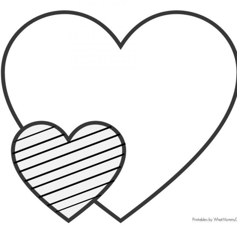 A black and white illustration of two overlapping hearts. The larger heart is outlined with a thin black line, and the smaller heart, positioned to the left, features diagonal black stripes. Perfect for kids' heart coloring pages. The text "Printables by WhatMommyDoes.com" is in the bottom right corner.