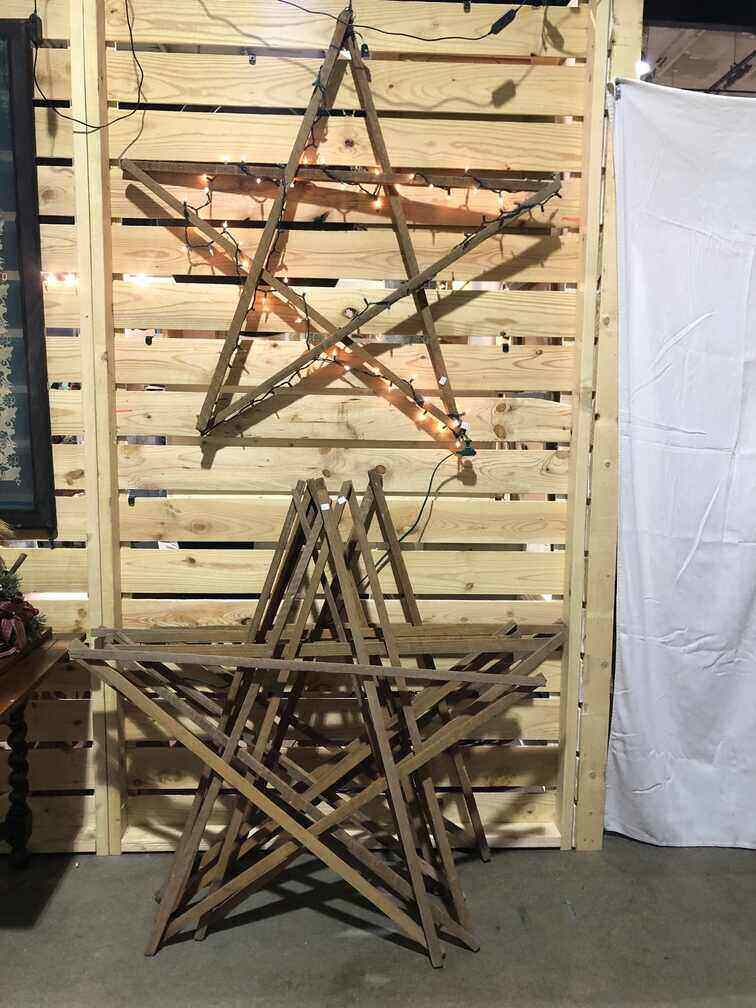 reclaimed wood star with lights on it