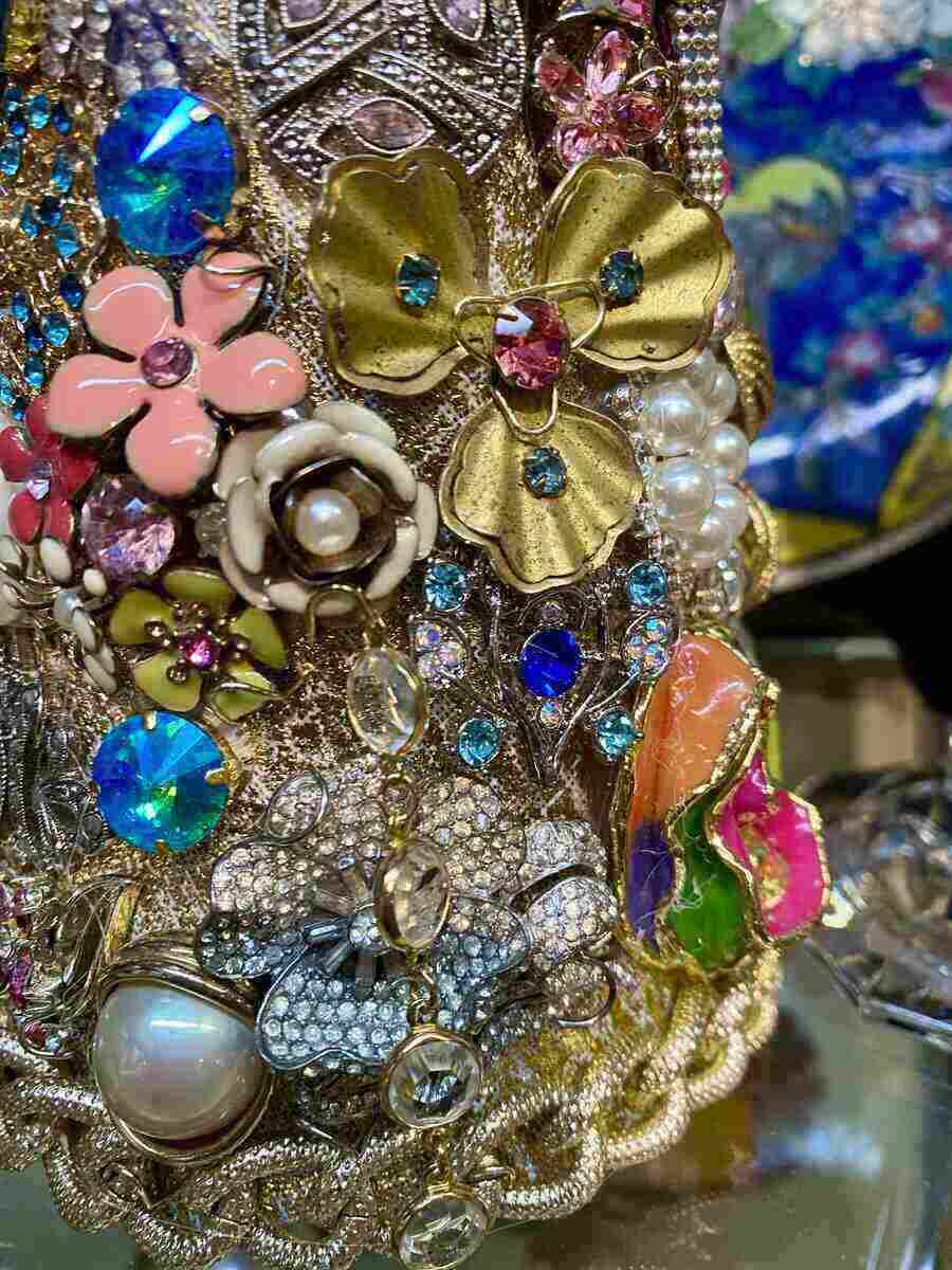 upcycled DIY brooch tree made from different thrifted jewelry pieces
