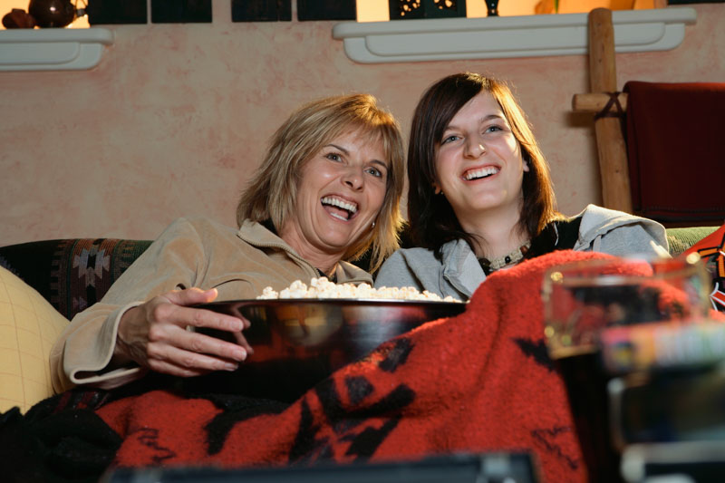 movie night at home as a low cost gift idea