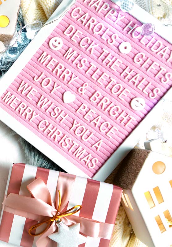 A pink letterboard, a fun and stylish family christmas gift idea