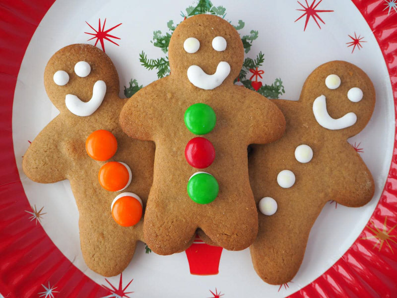 gingerbread men cut out cookies with candy buttons