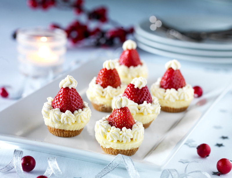 Santa hat mini cheesecakes with strawberries for the hat