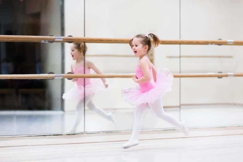 Child taking a ballet class as an experience gift