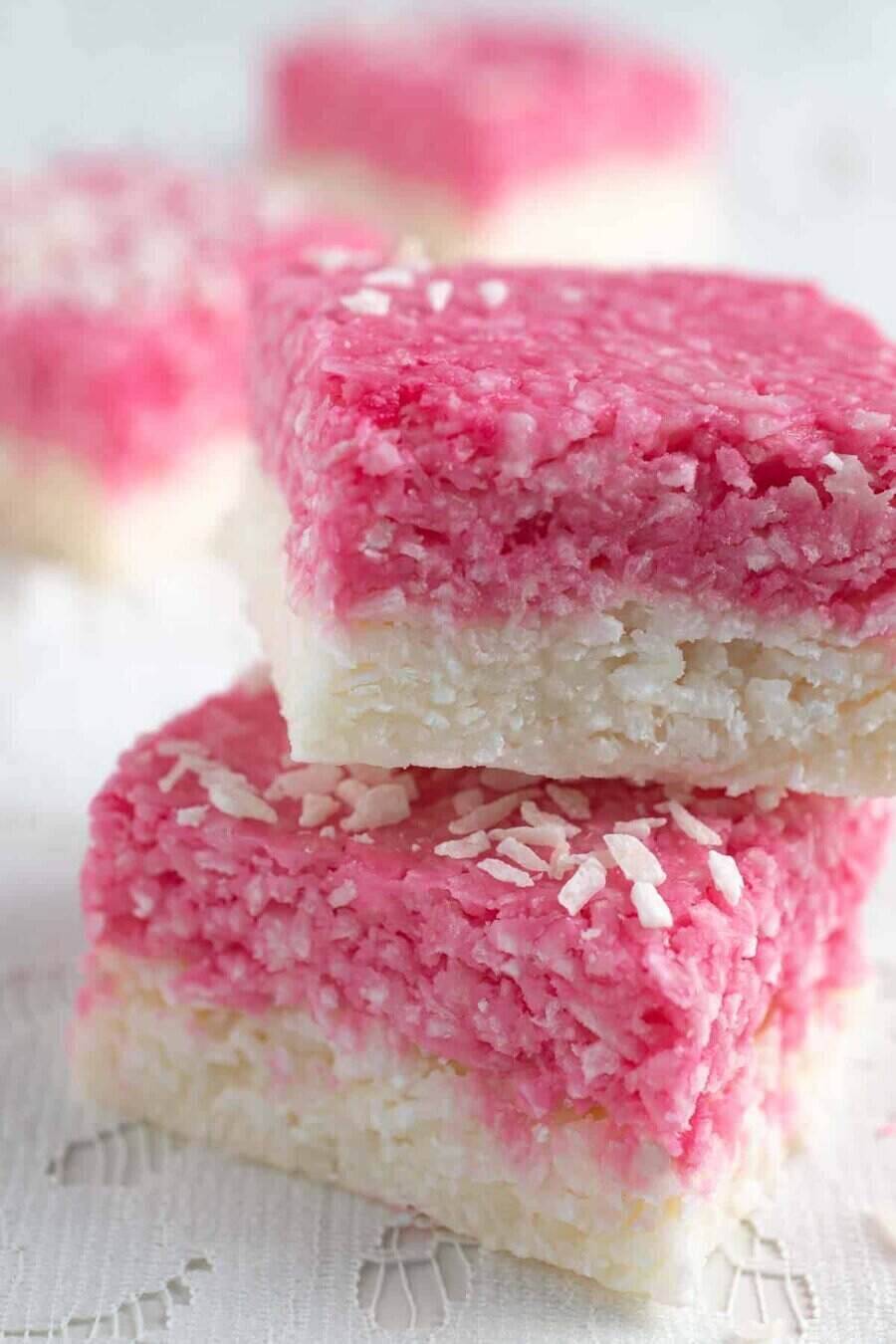 squares of pink and white coconut ice dessert bars