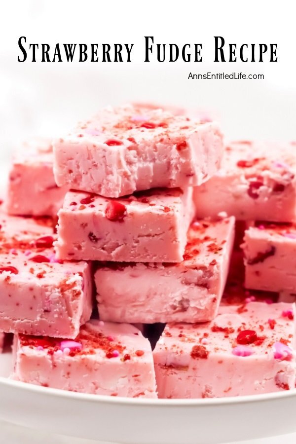 squares of pink strawberry fudge on a plate