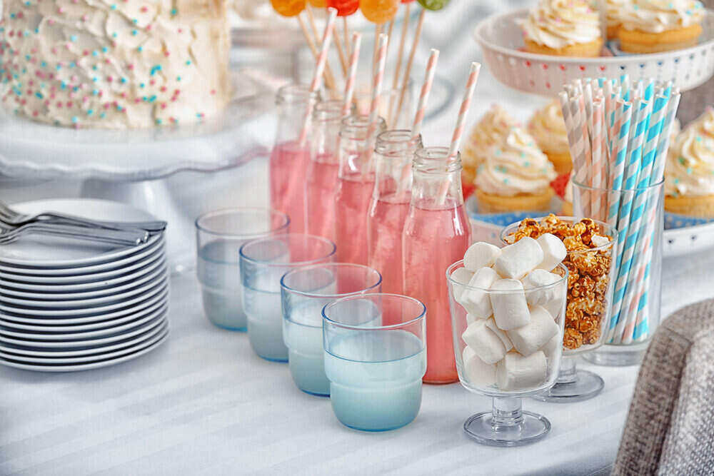 Buffet table with different treats indoors for a baby shower brunch