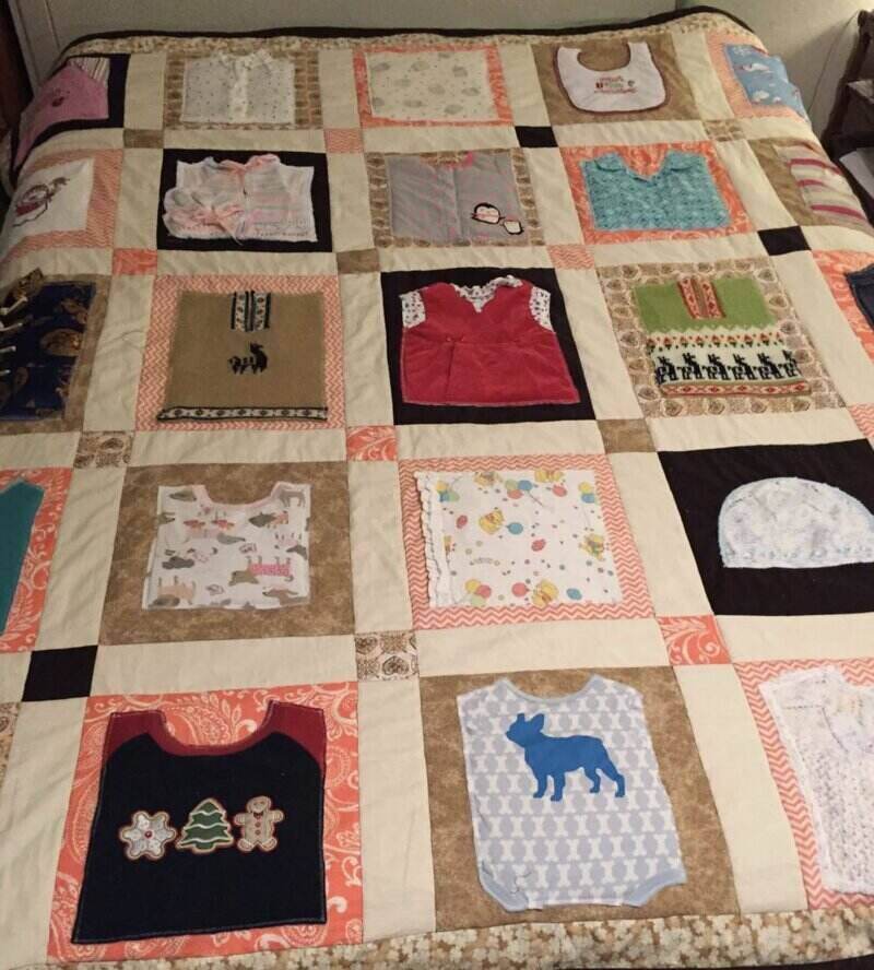 Quilt made from old baby clothes as a present for mother's day