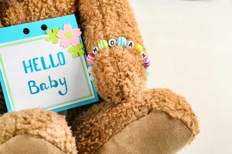 hello baby message on a blue card