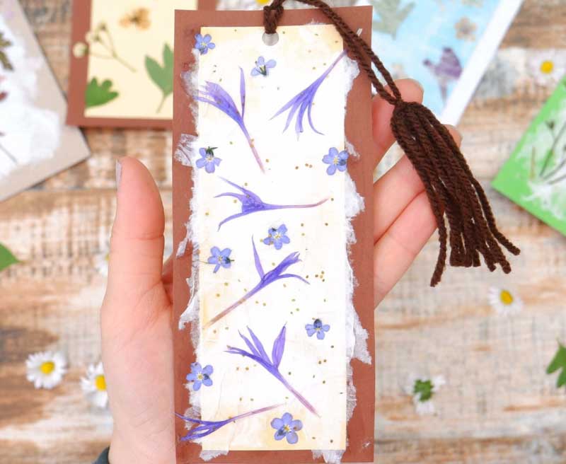 pressed flowers on a simple bookmark