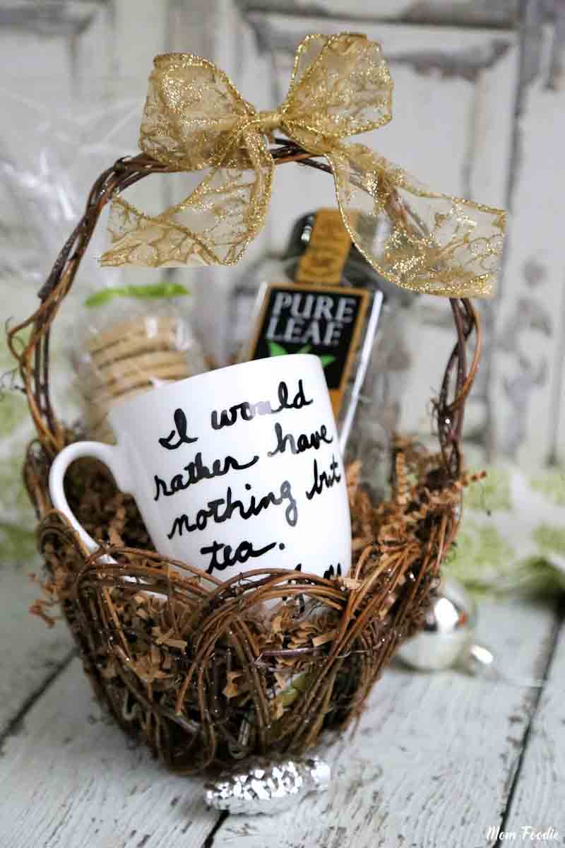 DIY tea mug in a basket with gourmet tea