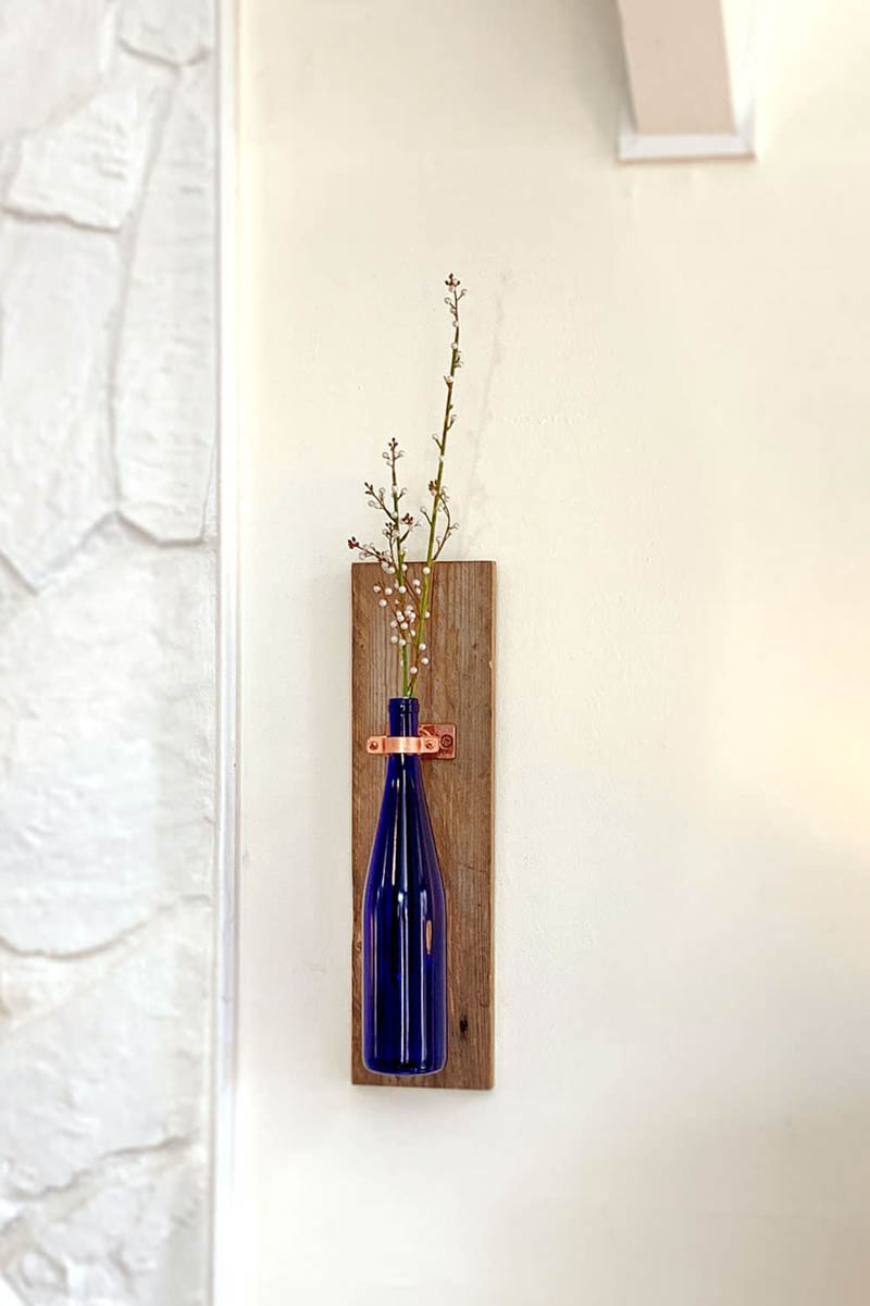 wine bottle vase project craft mounted on a wall