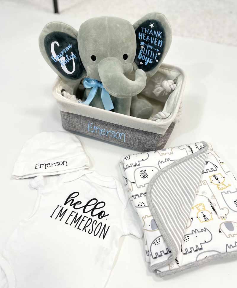 https://www.whatmommydoes.com/wp-content/uploads/2022/11/blue-and-gray-newborn-gifts.jpg