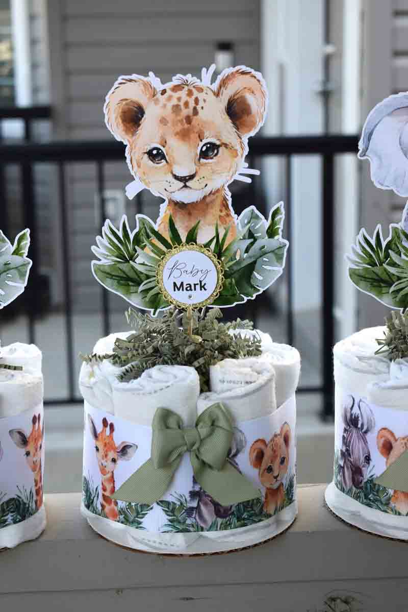 baby cheetah cake topper on a baby gift