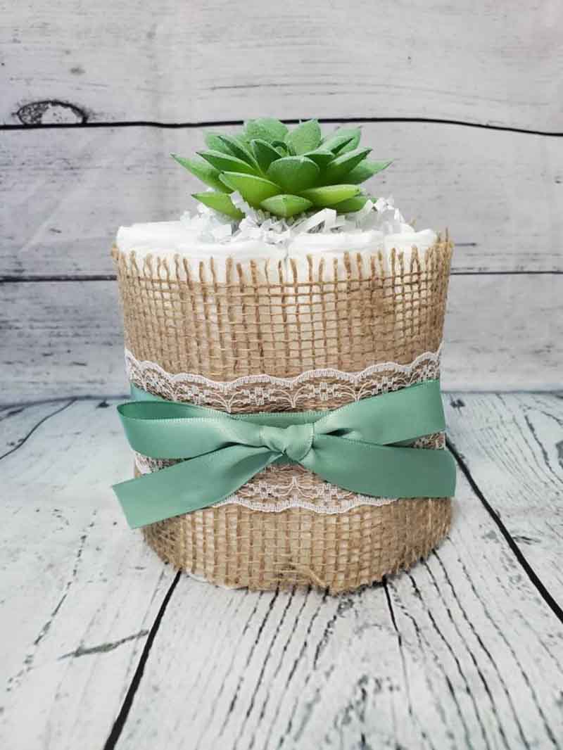 burlap wrapped pampers with a succulent topper for easy diaper gift ideas