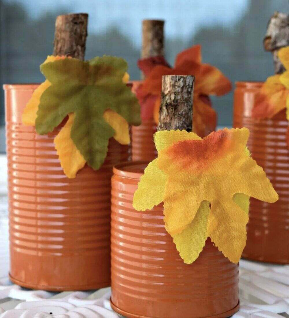 Tin can pumpkin centerpieces for baby shower.