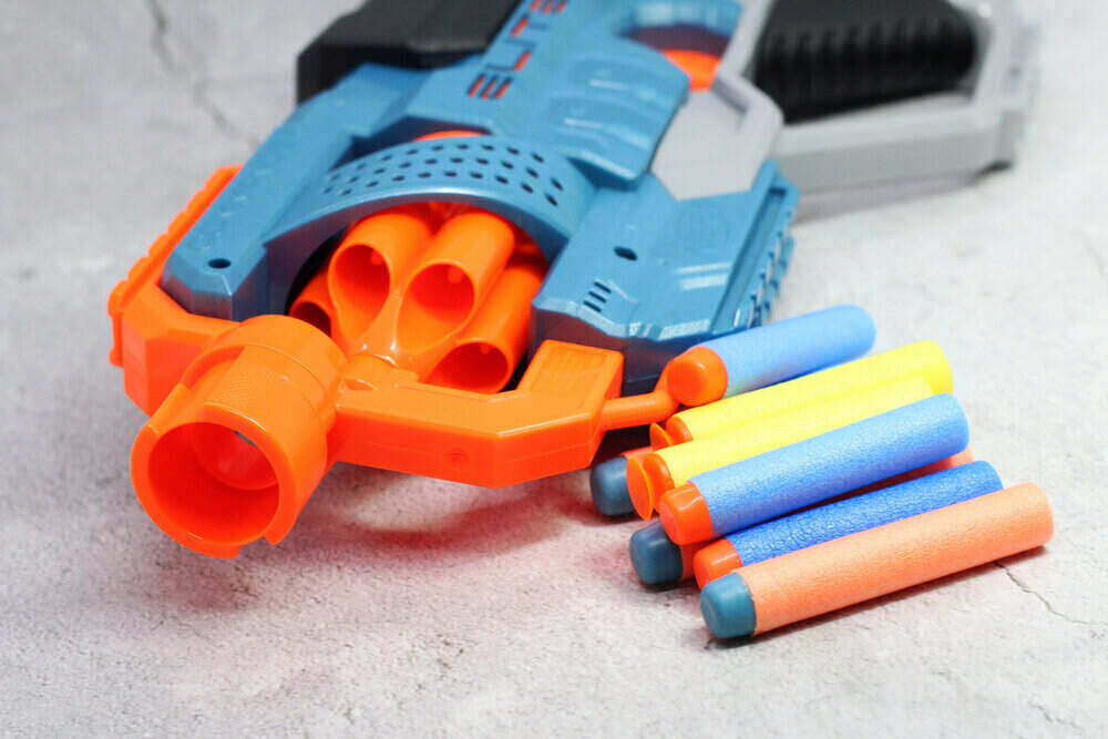 Foam bullet and gun toy up close