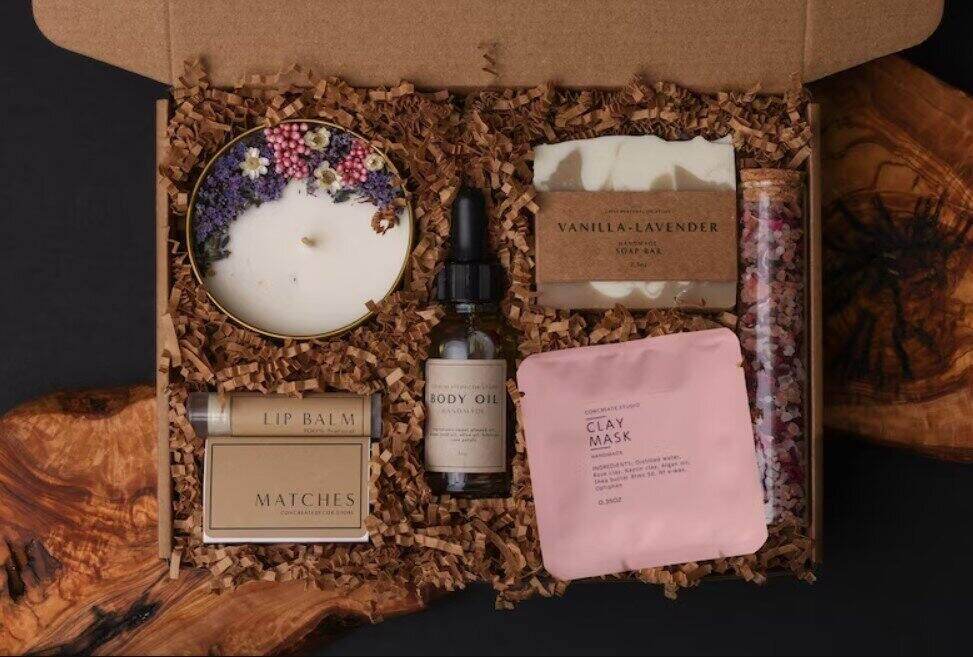 gift box for girls with spa items in a cardboard box with paper grass
