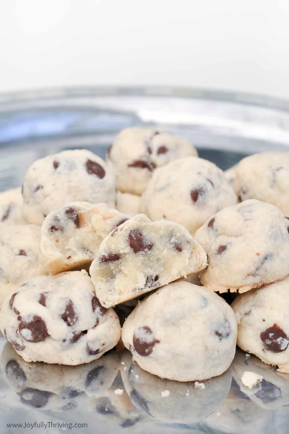 Bite-sized chocolate chip shortbread cookies with a crumbly, buttery texture.