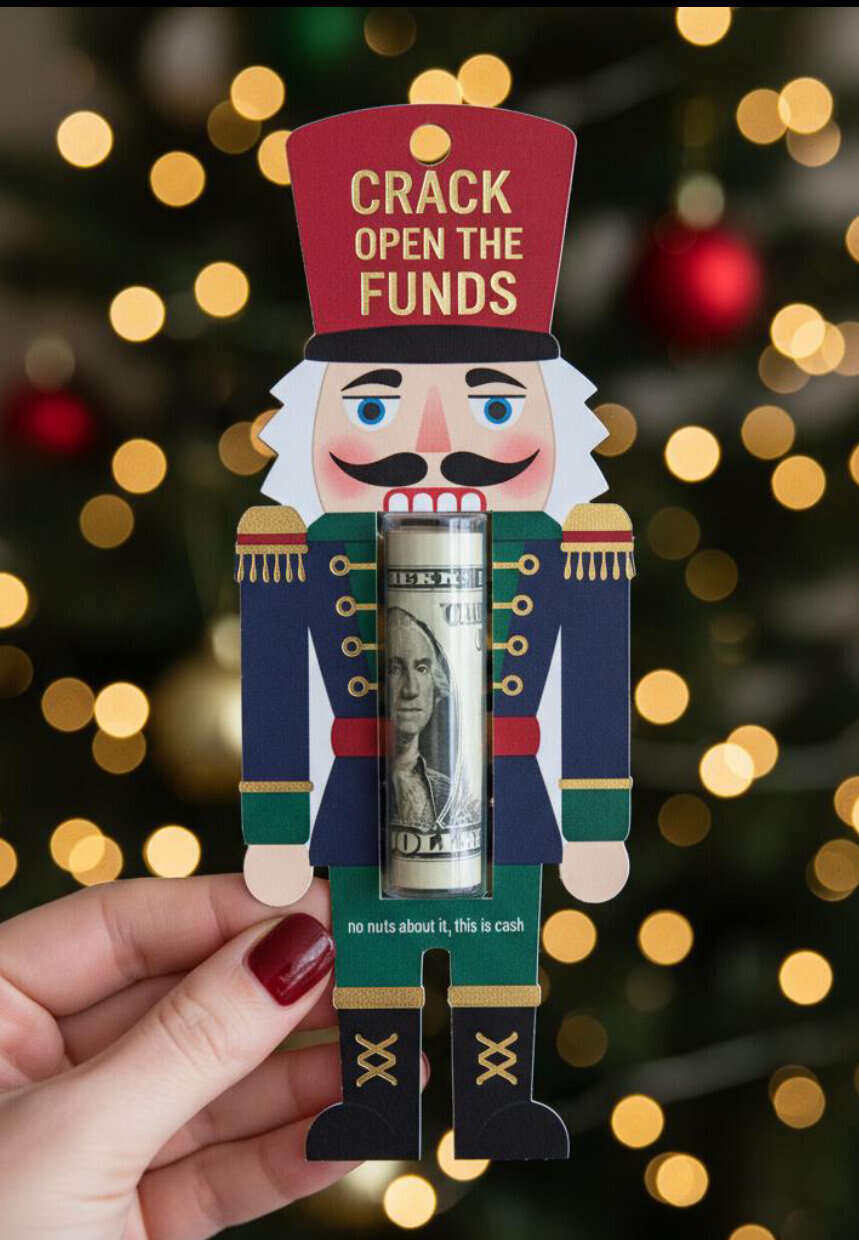 nutcracker card with a plastic sleeve holding money with the words crack open the funds on the hat